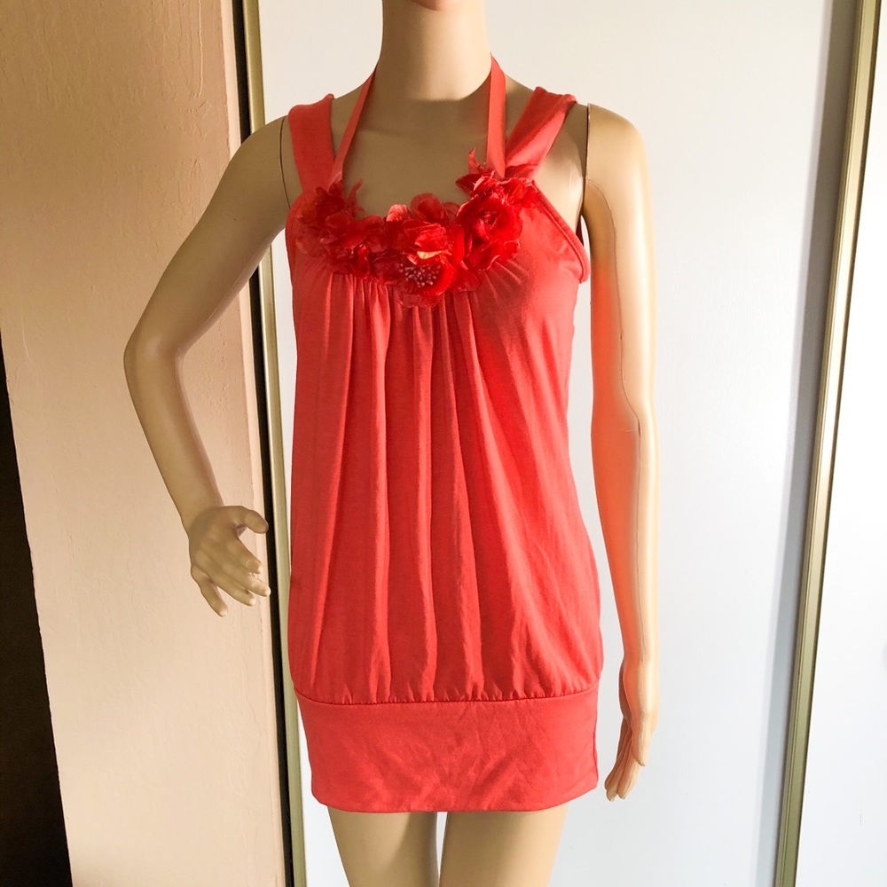 Coral mini dress with floral decoration and ribbon